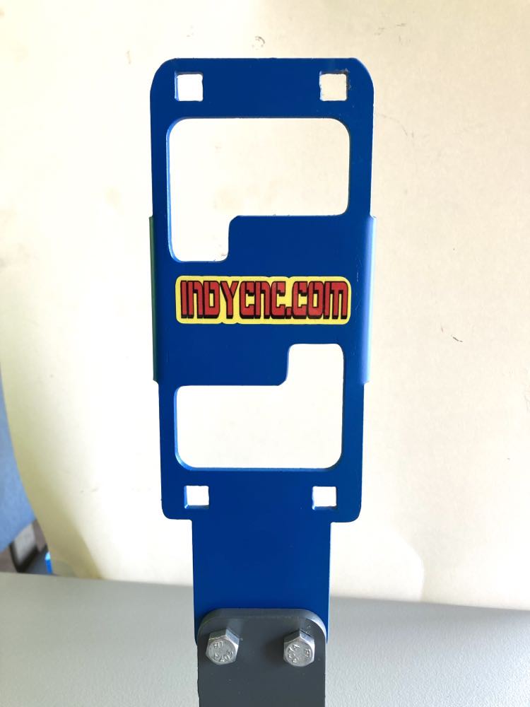 A blue car holder with a yellow logo on it.